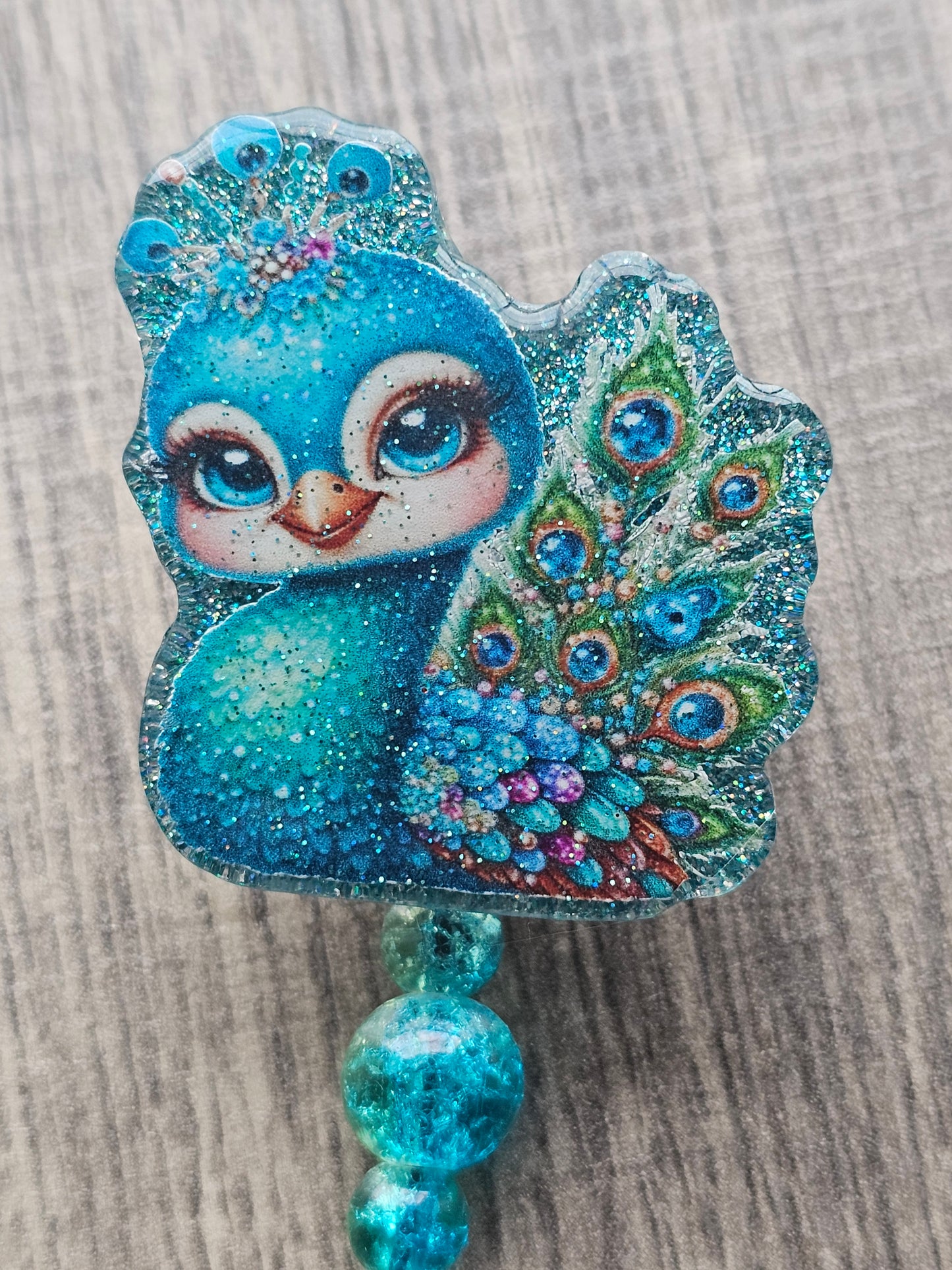 Aquamarine Majesty Peacock Badge Reel