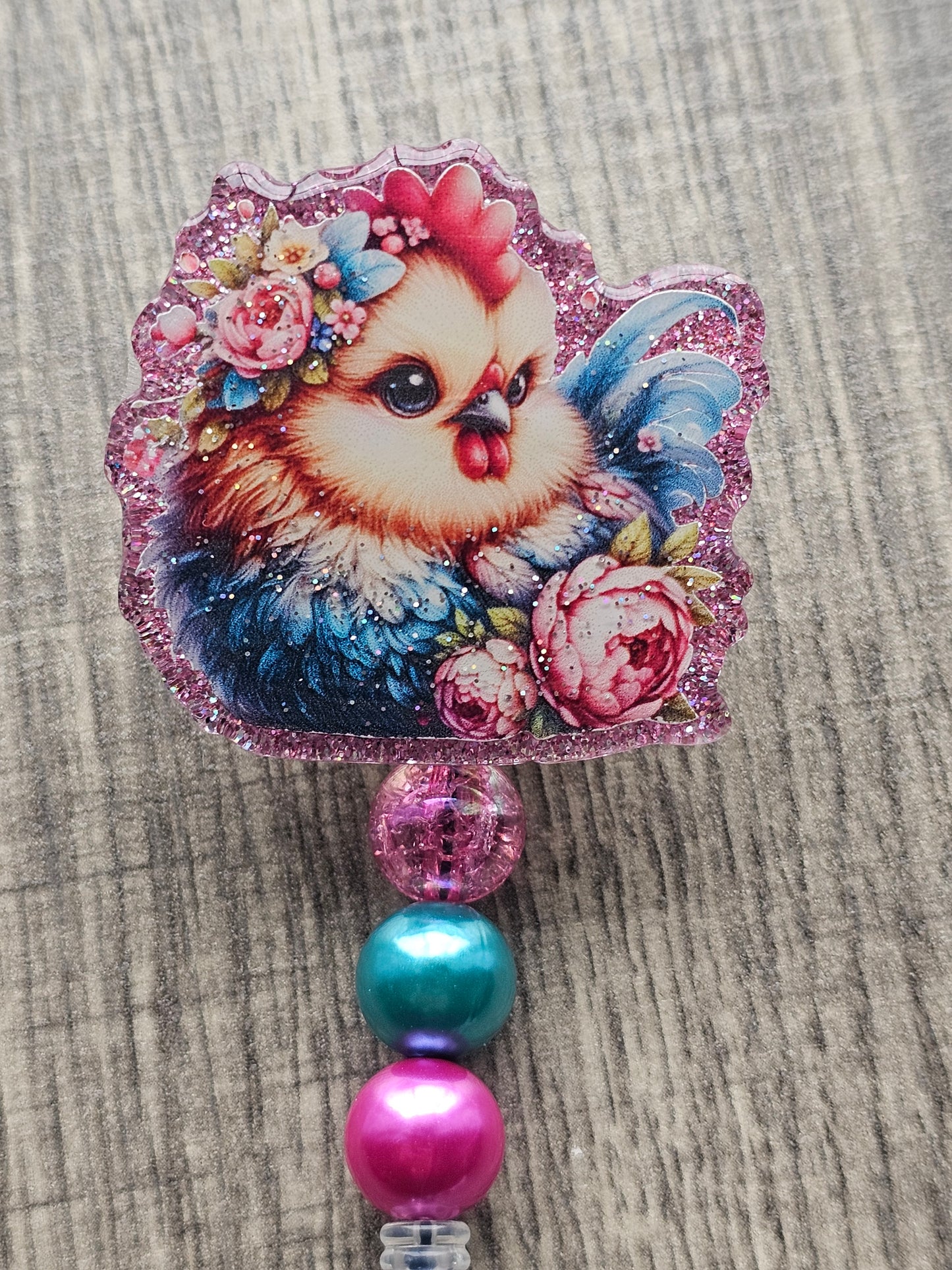 Feathered Bloom Badge Reel