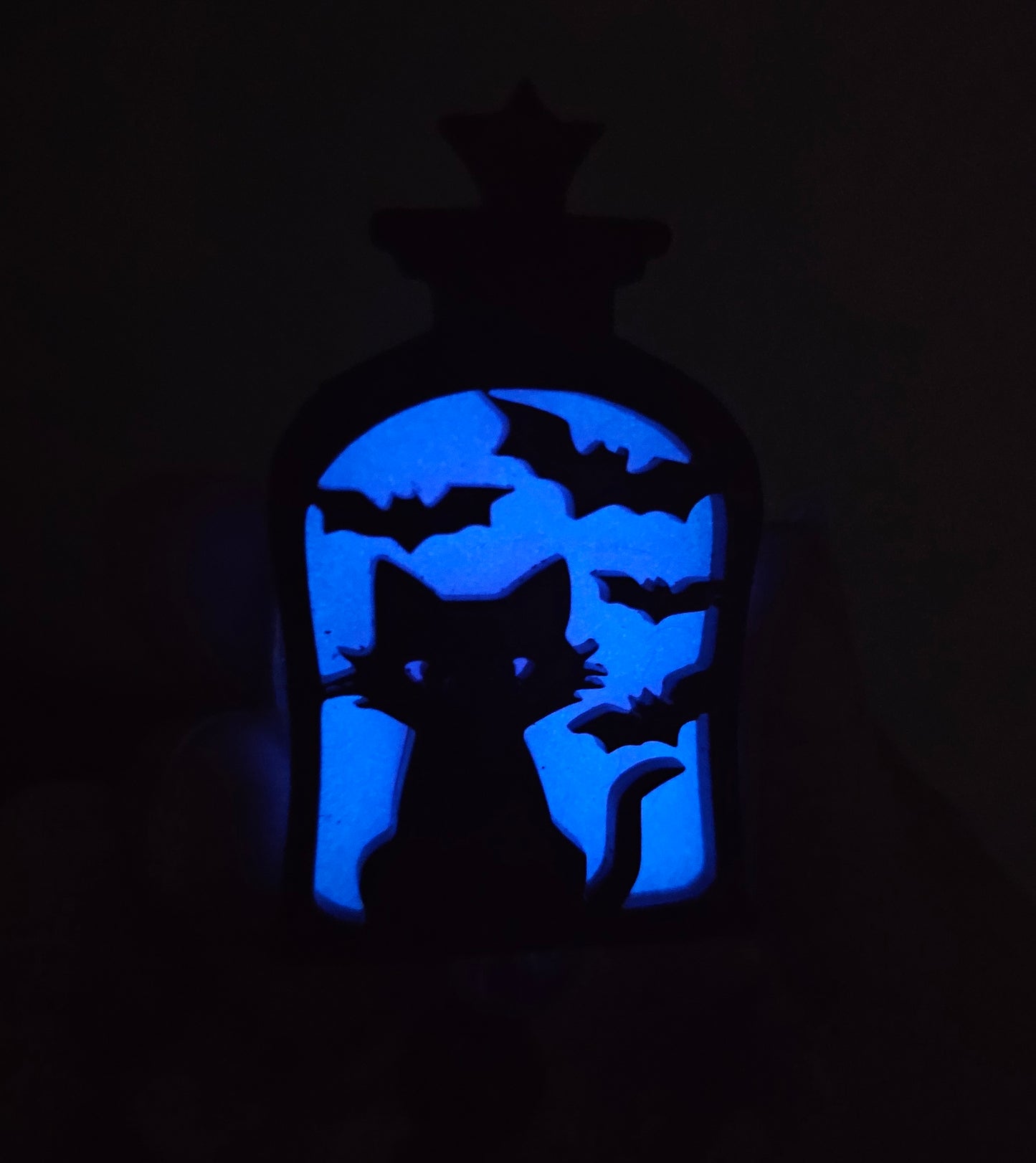 Glow-in-the-Dark Lantern Cat Badge Reel - Purple Eerie Charm