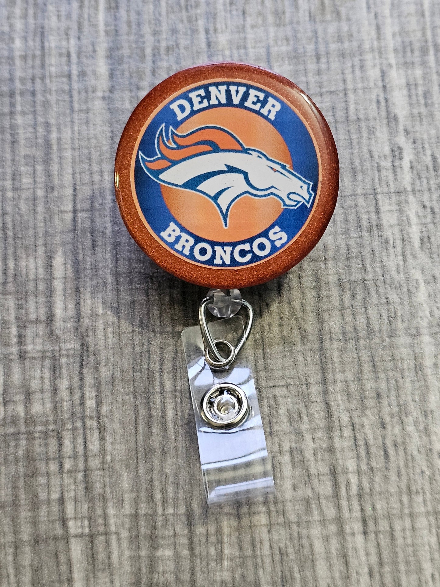A Badge Reel with the Denver Broncos Logo