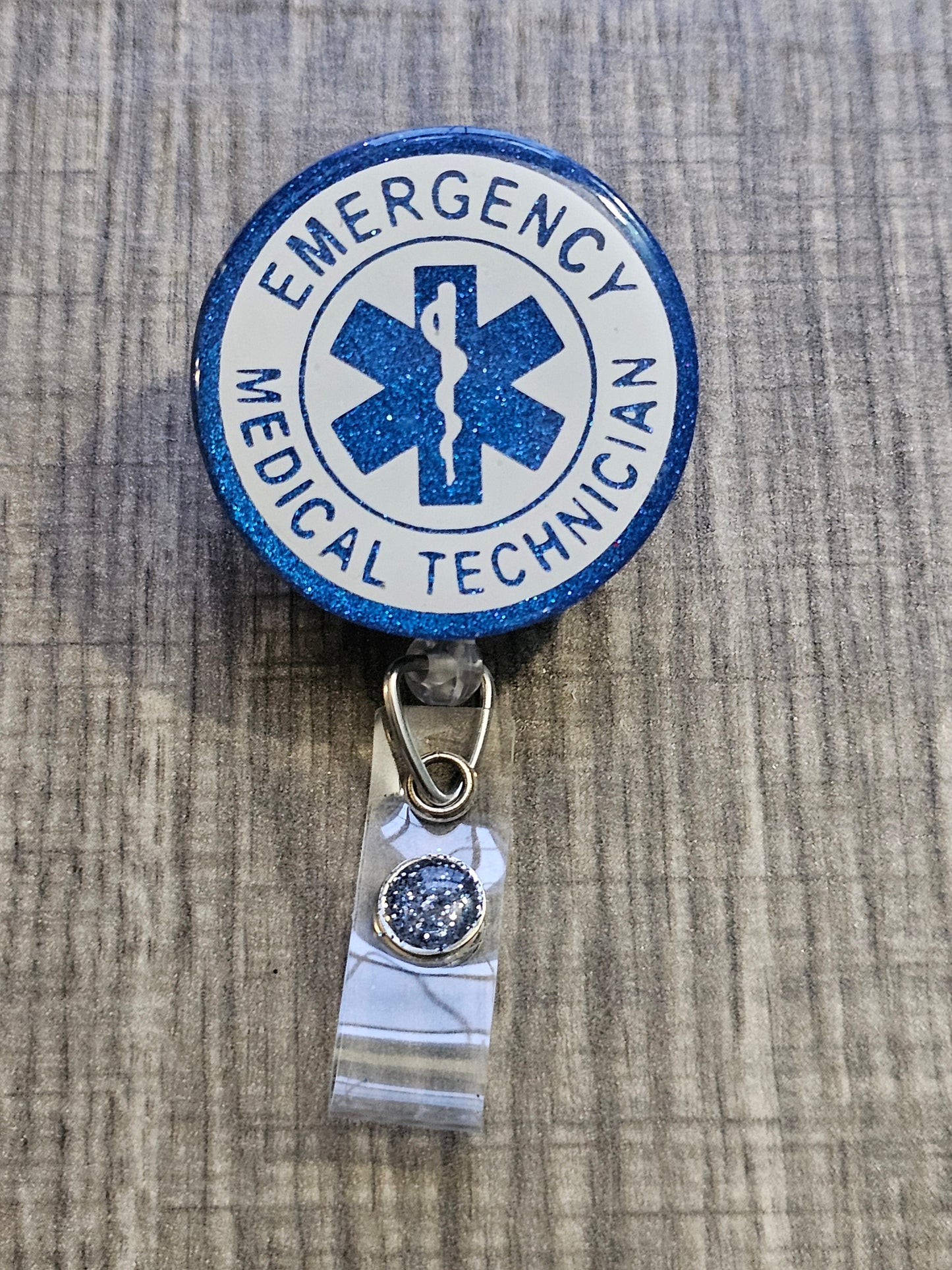 A Badge Reel with the words Emergency Medical Technician (EMT)