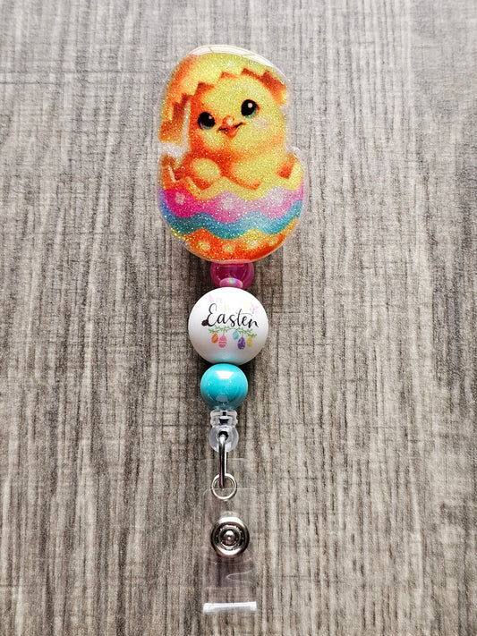 A Badge reel featuring an adorable easter duckling hatching out of an easter egg.