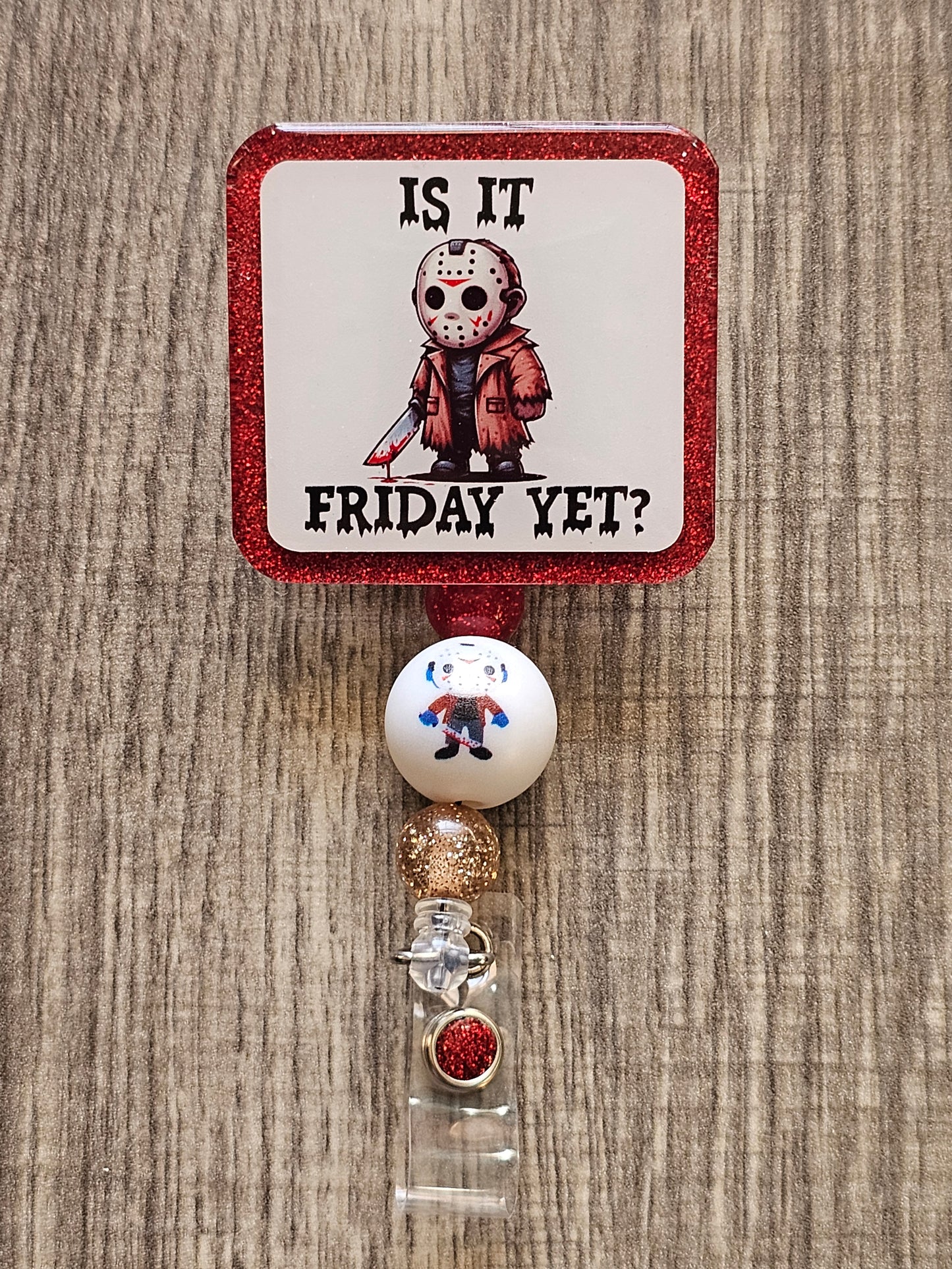 Jason from Friday the 13th holding a bloody knife with the words is it Friday Yet?