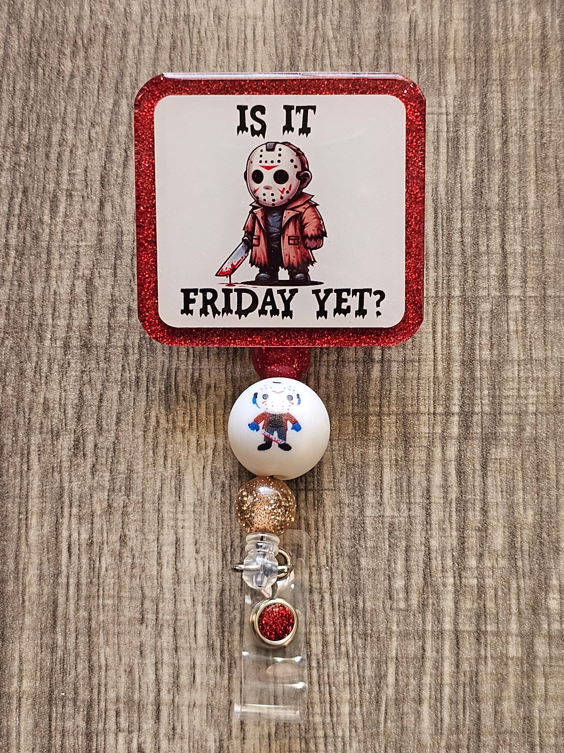Jason from Friday the 13th holding a bloody knife with the words is it Friday Yet?