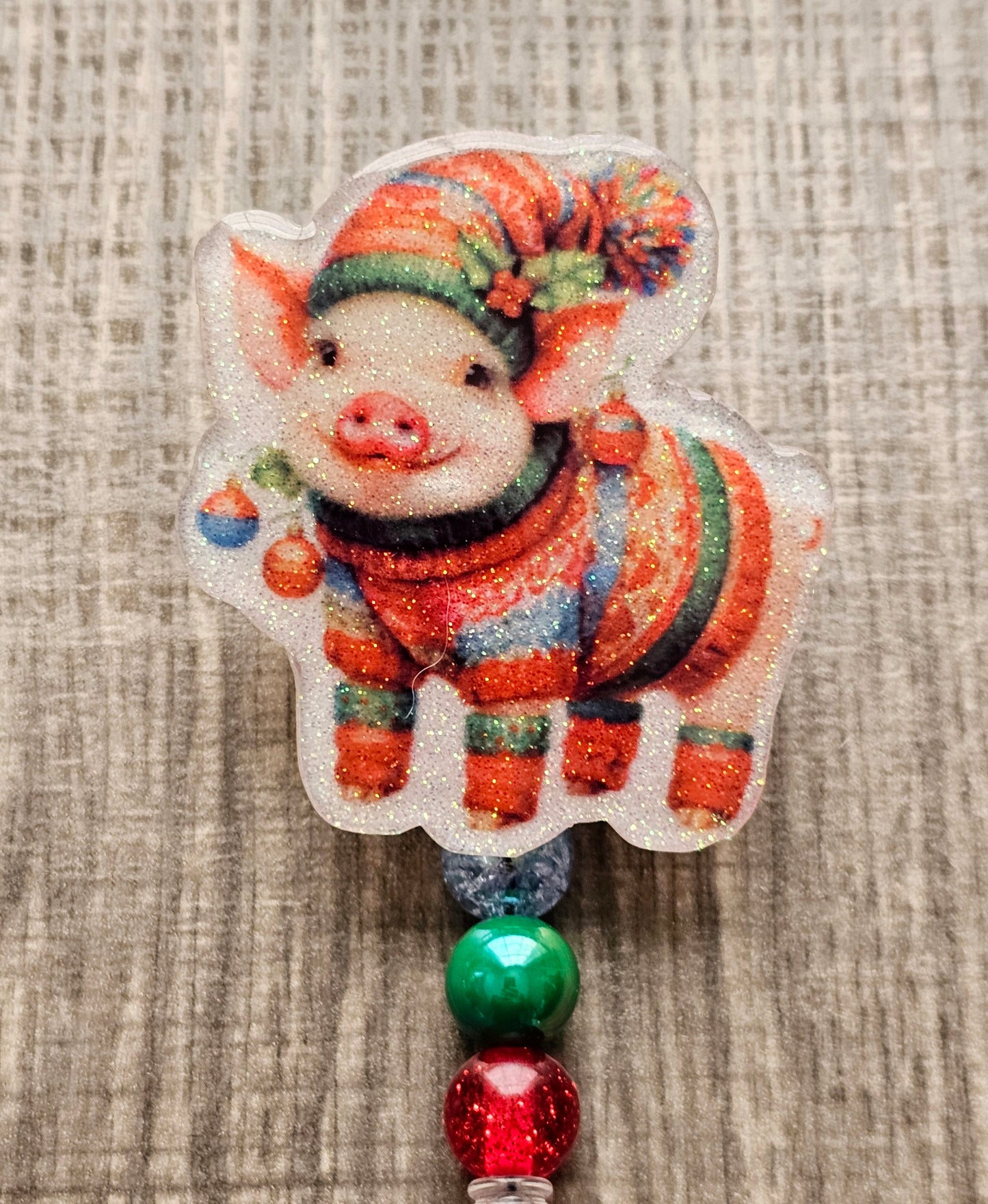Festive Piglet Badge Reel