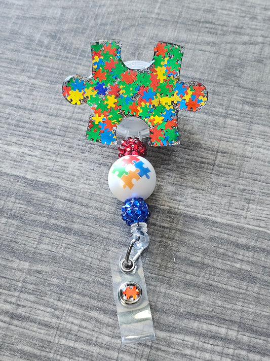 Autism Puzzle Piece Badge Reel
