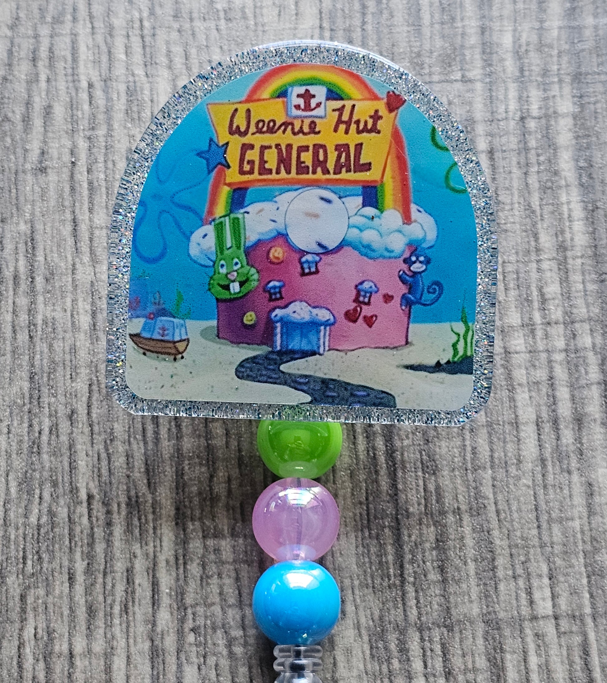 A badge reel displaying weenie Hut General in reference to SpongeBob