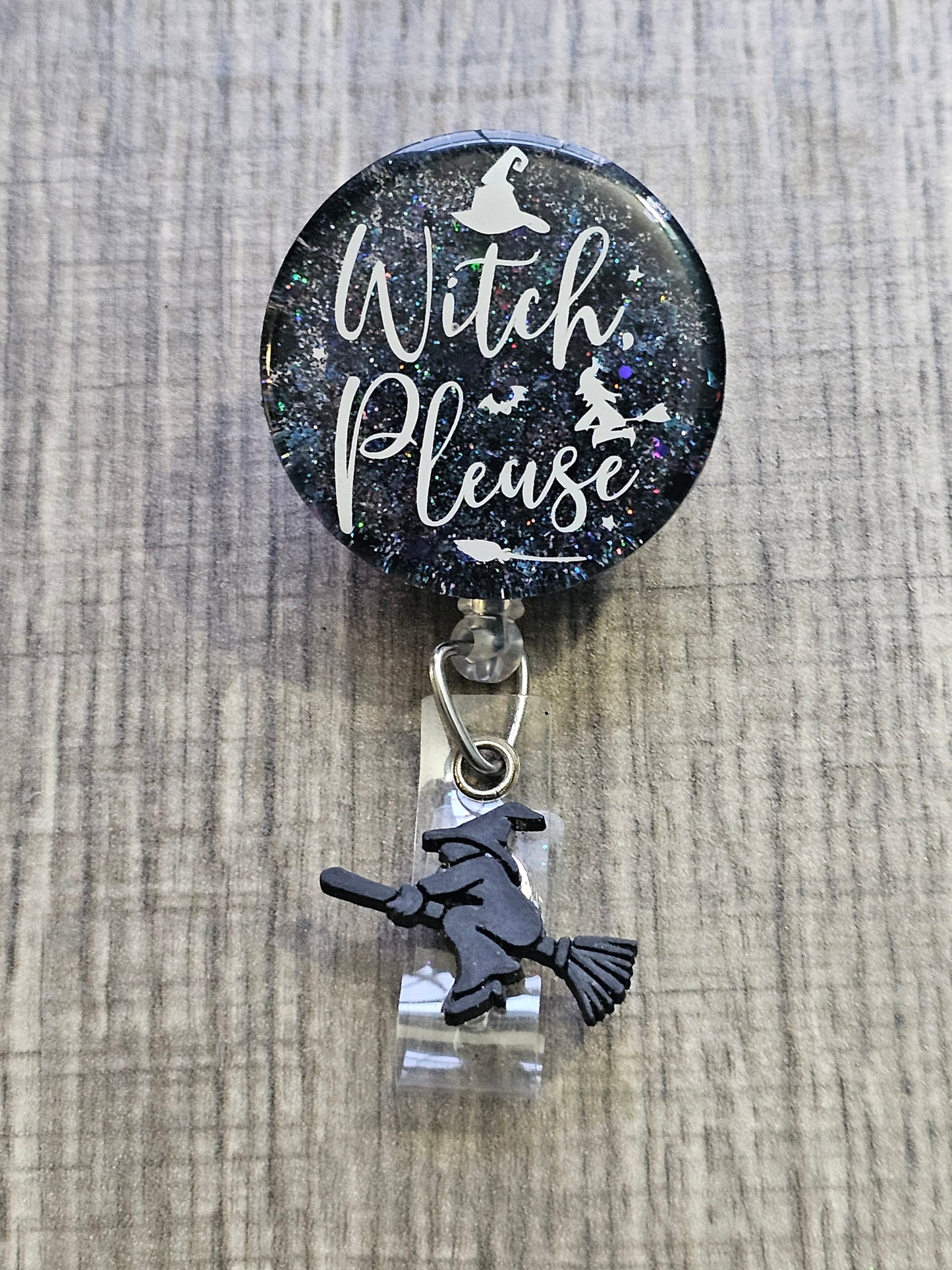 A Badge Reel with a starry background and a witch flying around with a broom with the statement Witch Please.
