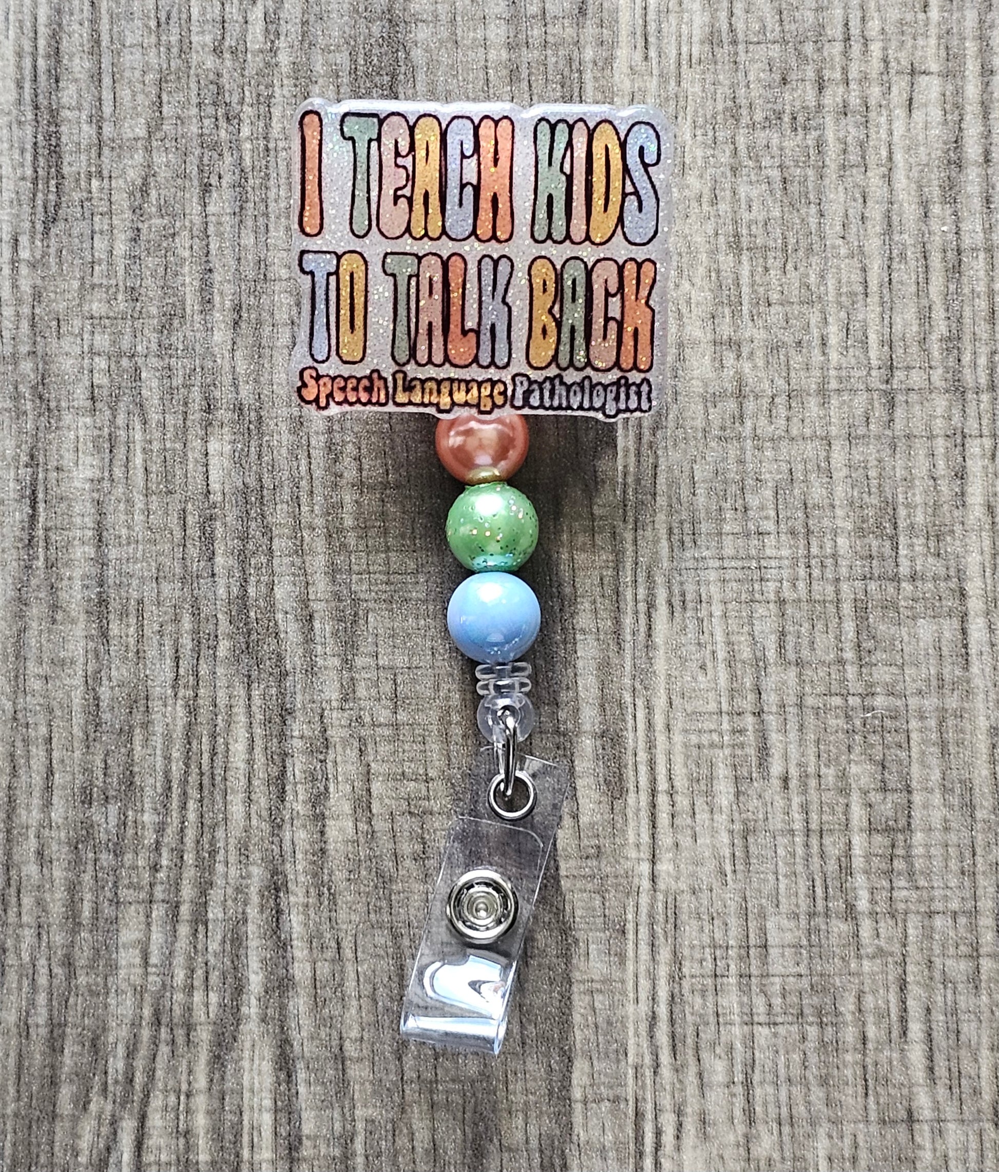 "I Teach Kids to Talk Back, Speech Language Pathologist" badge reel.