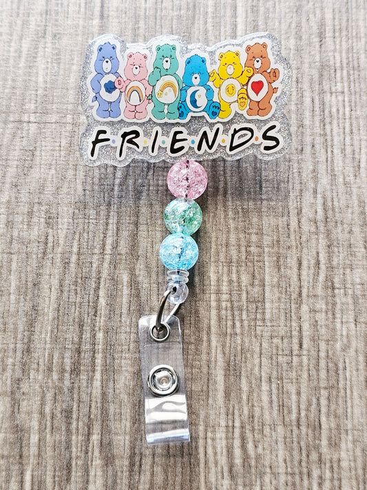 A badge reel featuring multiple Care Bears with a Friends-style text design.