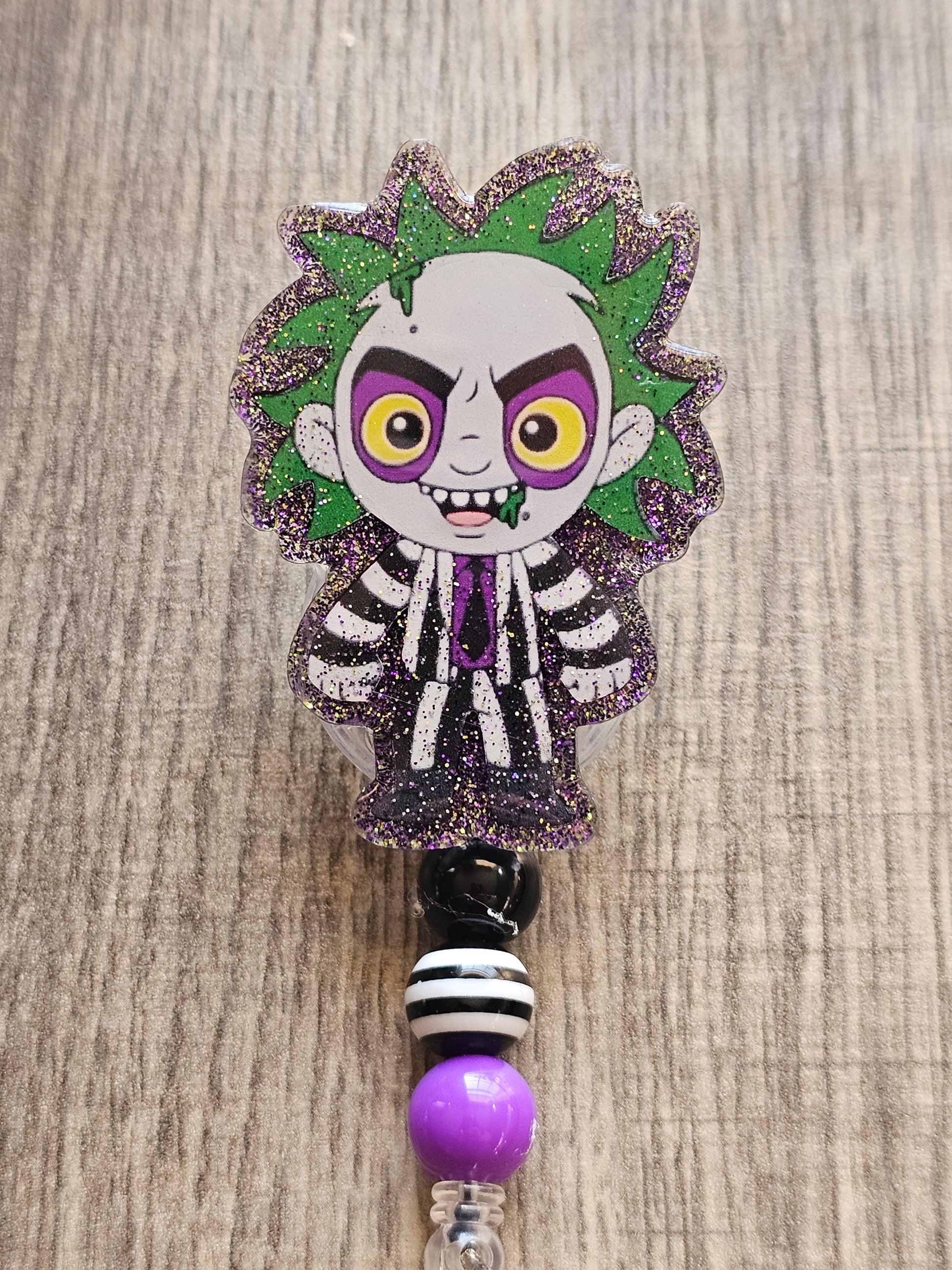 A badge reel featuring BeetleJuice