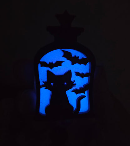 Glow-in-the-Dark Lantern Cat Badge Reel - Purple Eerie Charm