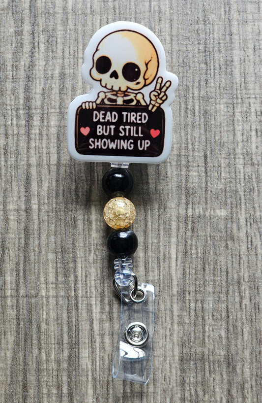 Skeleton character with a sign saying 'Dead tired but still showing up' on a badge holder against a textured background.