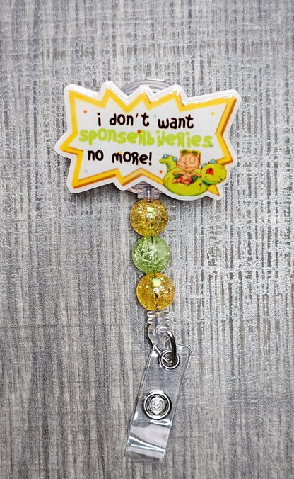 Rugrats themed badge reel with the phrase "I don't want sponsebilities no more!" and colorful beads.