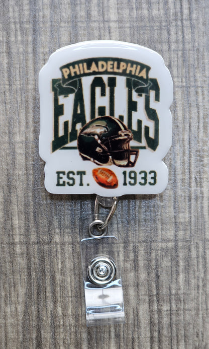 Philadelphia Eagles vintage-inspired helmet design with Est. 1933 text on a retractable ID holder.