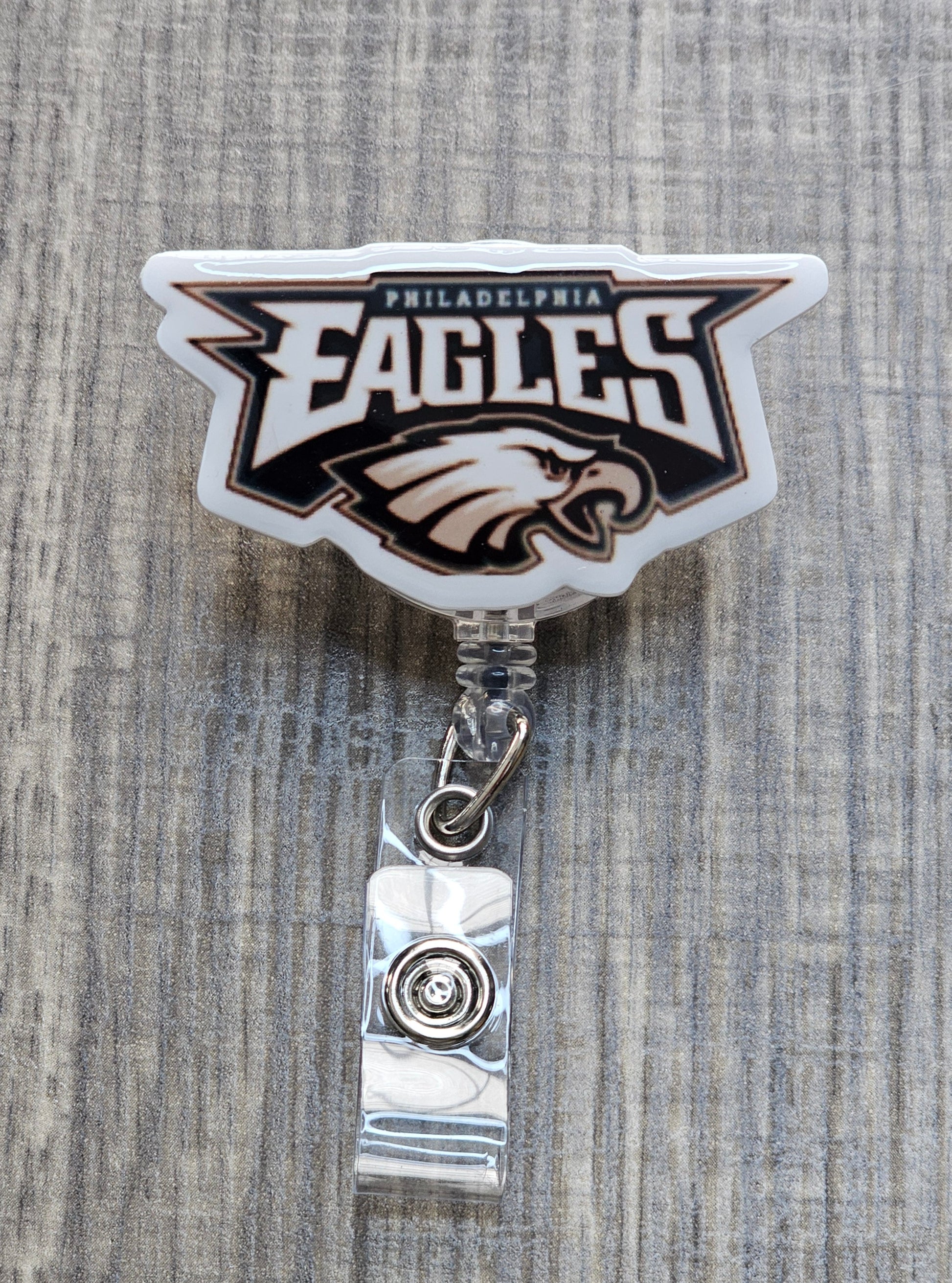 Unique Philadelphia Eagles mascot head badge reel with bold creative typography for NFL fans.