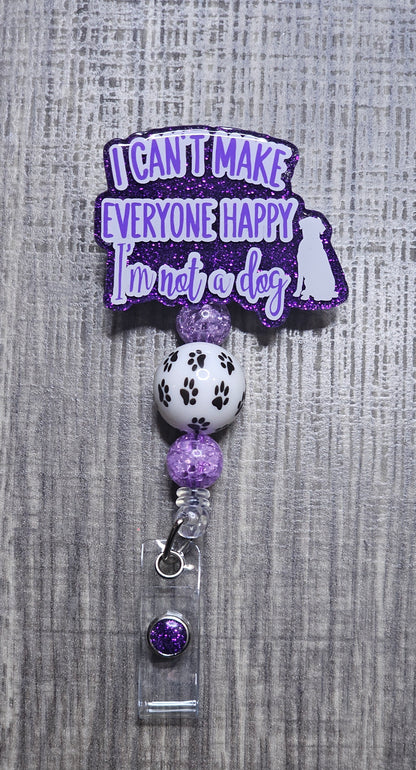 Badge holder with a humorous quote "I can't make everyone happy, I'm not a dog" on a gray textured background