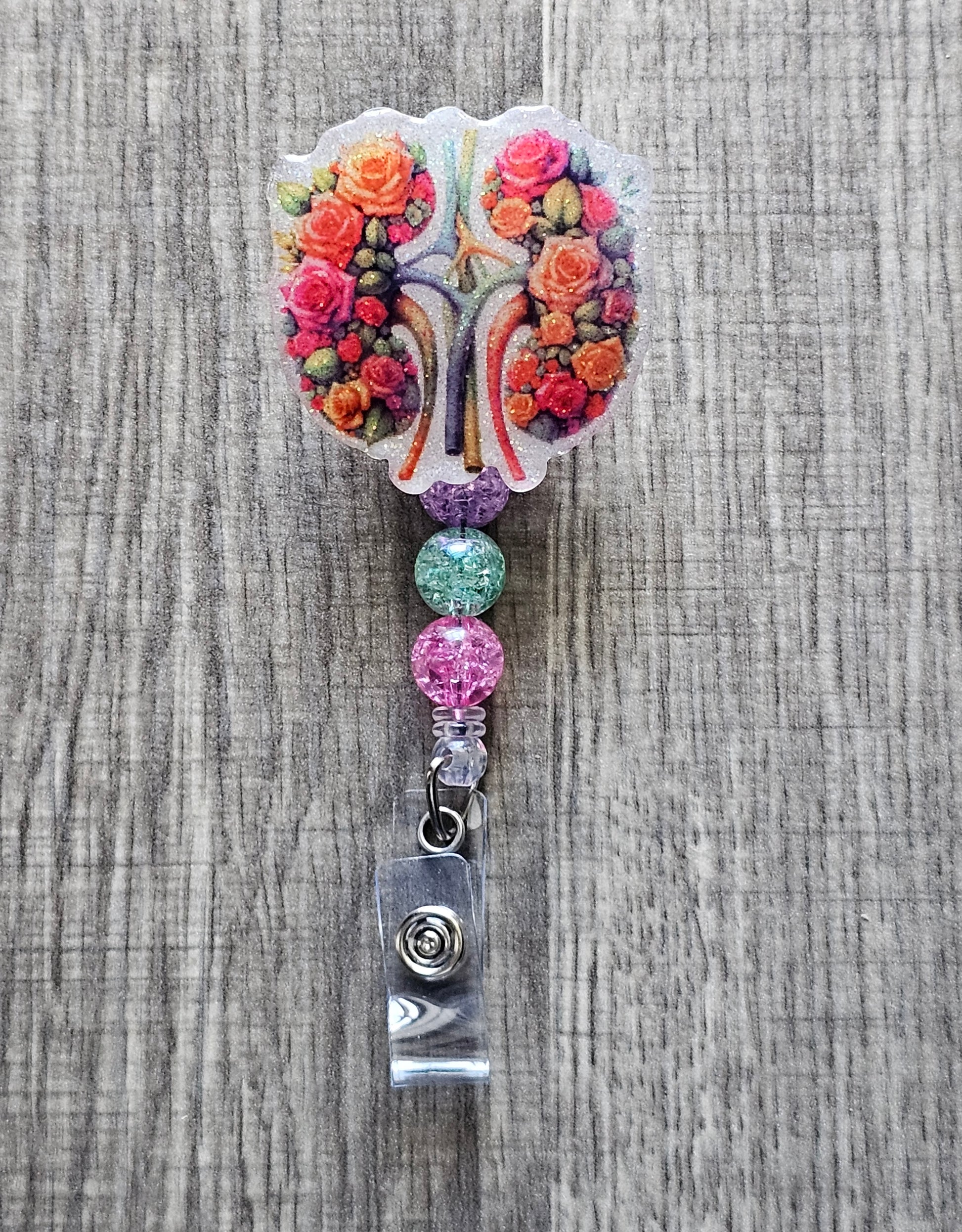 Kidney badge reel with coordinated colors and matching beads.