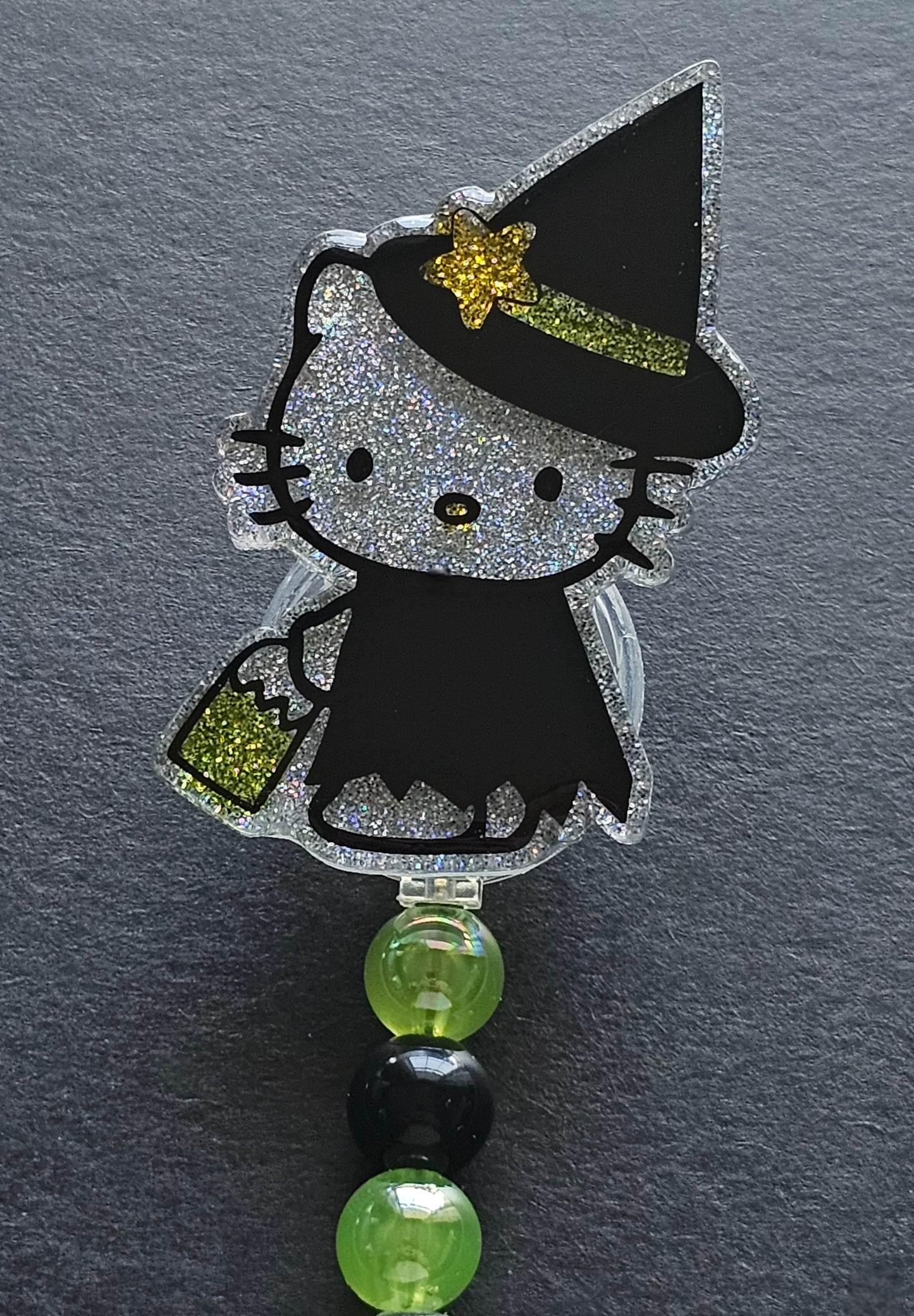 Hello Kitty Witch Badge Reel