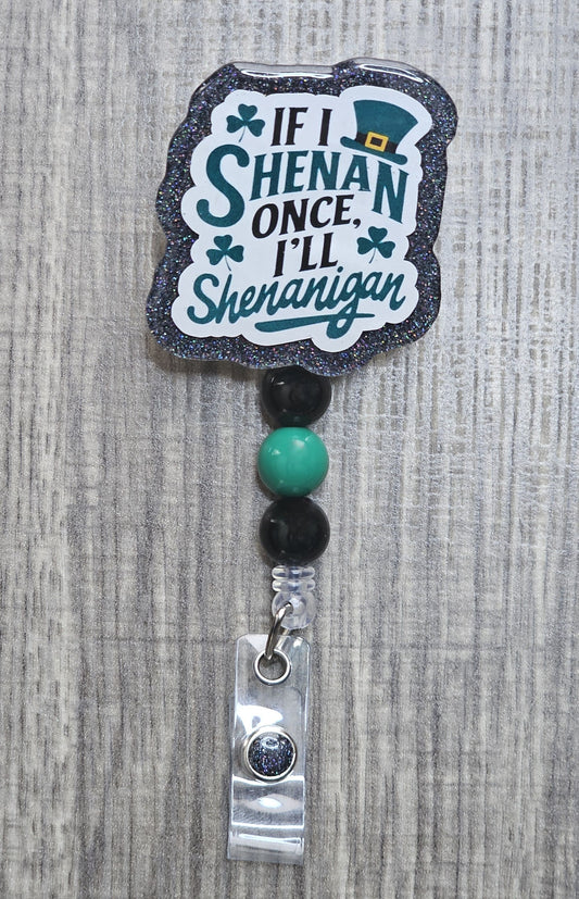 St. Patrick's Day badge reel featuring a green leprechaun hat and the phrase "If I Shenan once I’ll Shenanigan."