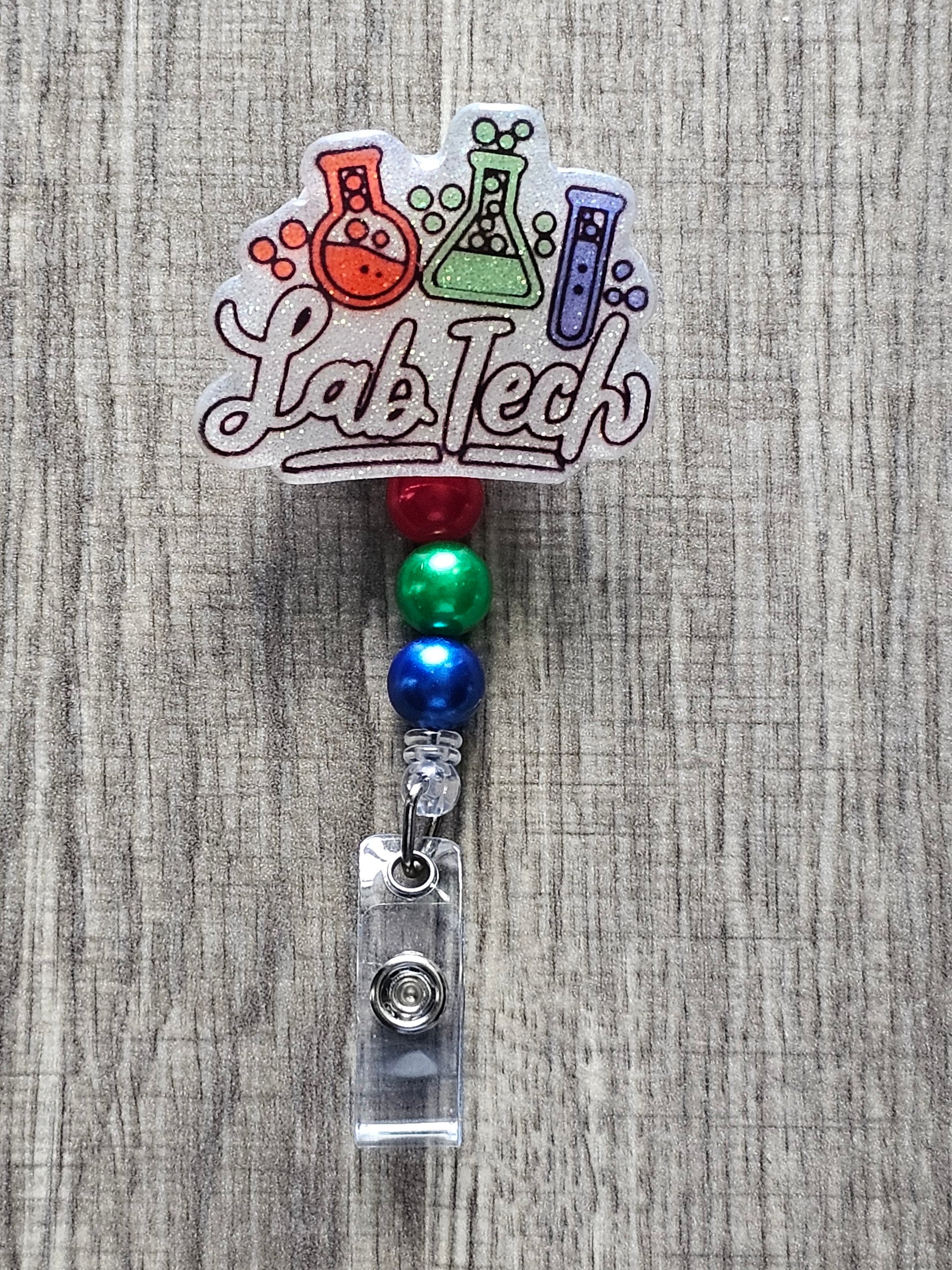 "Lab Tech" badge reel with 3 mixing glass bottles (green, red, blue bubbles).