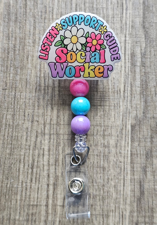 Badge holder with colorful beads and   reads 'Listen Support Guide Social Worker' on a textured background.