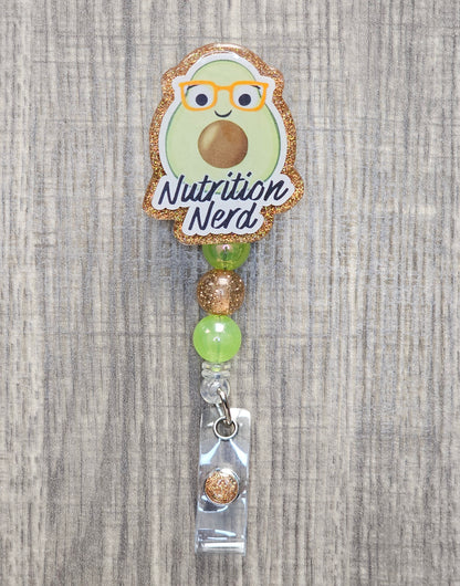 Avocado-themed badge holder with 'Nutrition Nerd' text on a textured background.