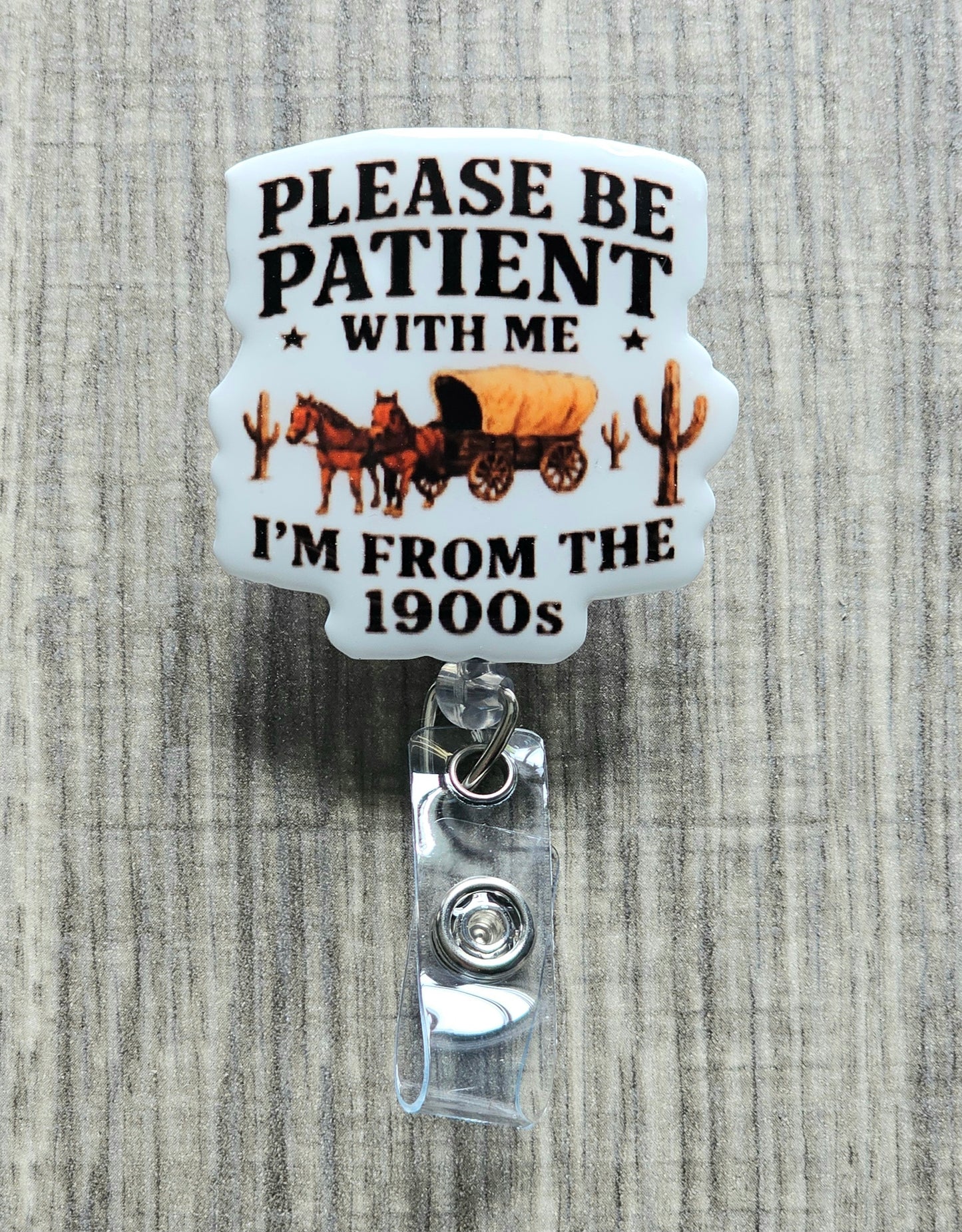 Vintage western style graphic of a horse and wagon with cacti and the text "Please be patient with me I'm from the 1900s".