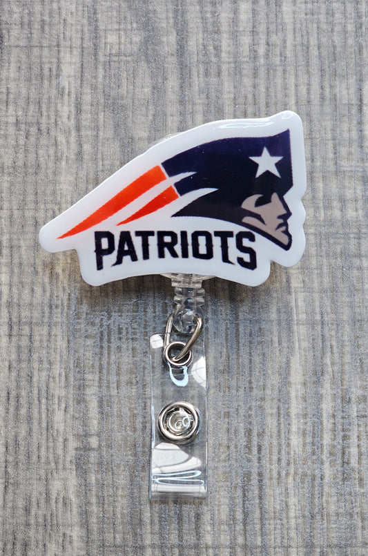 New England Patriots iconic logo and "Patriots" team name on a circular retractable badge reel.