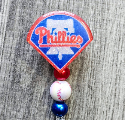 Philadelphia Phillies-inspired baseball badge reel shaped like a baseball base with optional beads.