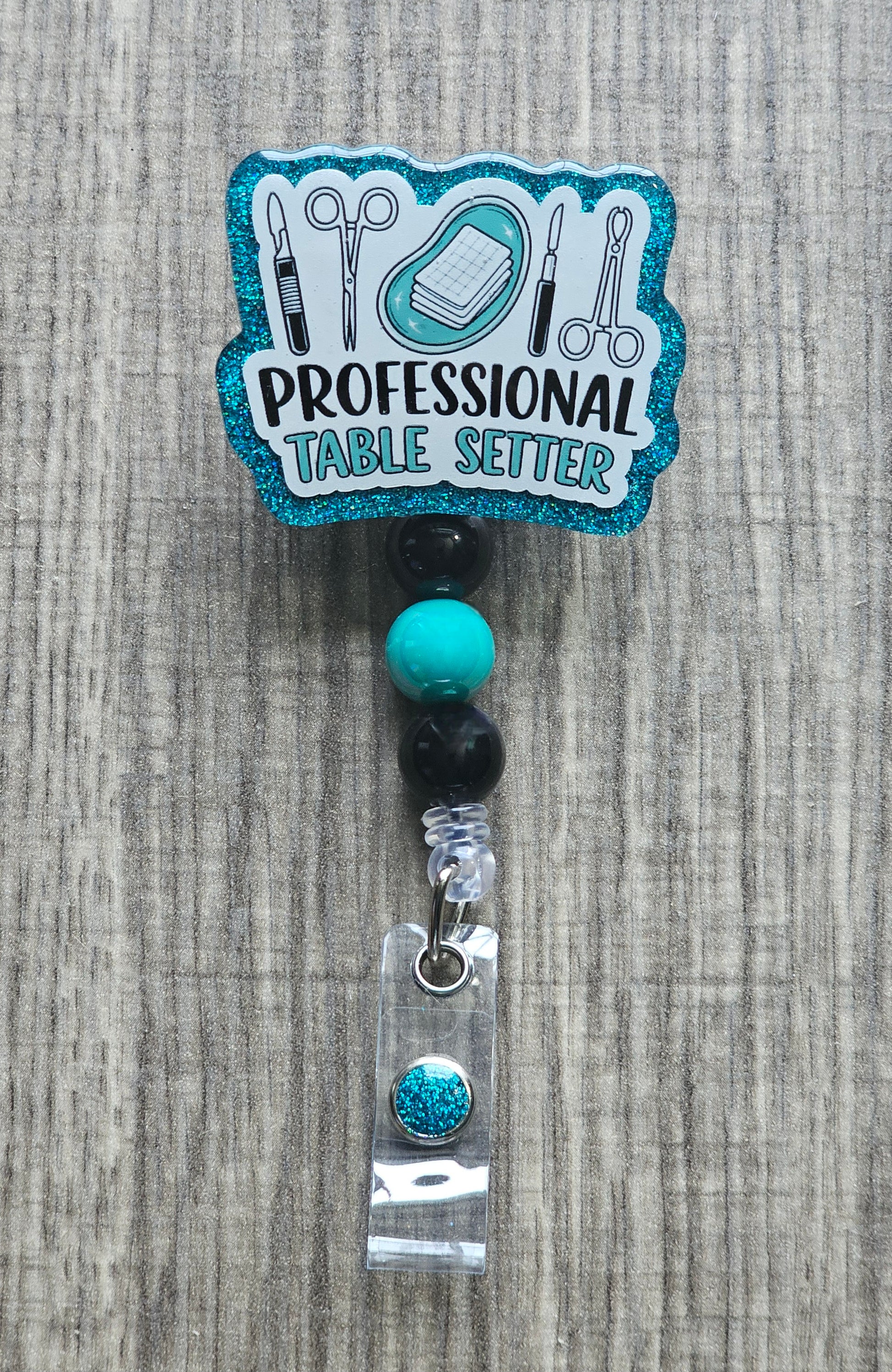 Graphic of surgical instruments and a scalpel with the text "Professional Table Setter".