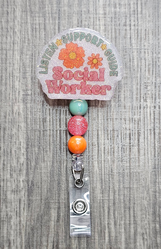 Badge holder with colorful beads and   reads 'Listen Support Guide Social Worker' on a textured background.