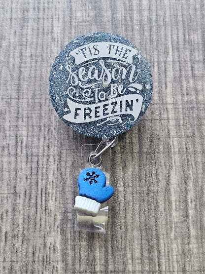 A badge reel stating Tis the Season to be Freezing 