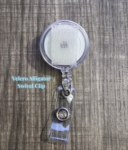 Retractable badge reels with strong Velcro attachments, featuring an alligator swivel clip design. Perfect for secure and convenient ID badge or key storage.