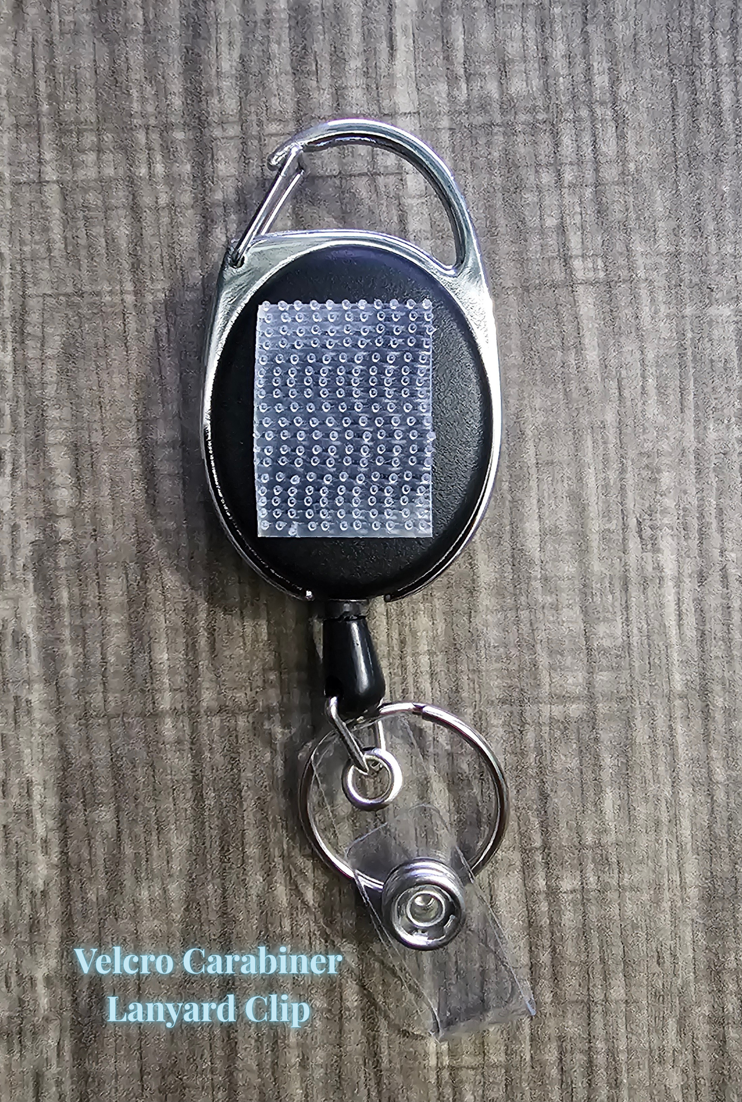 Retractable badge reels with strong Velcro attachments, featuring a durable carabiner style. Perfect for secure and convenient ID badge or key storage.
