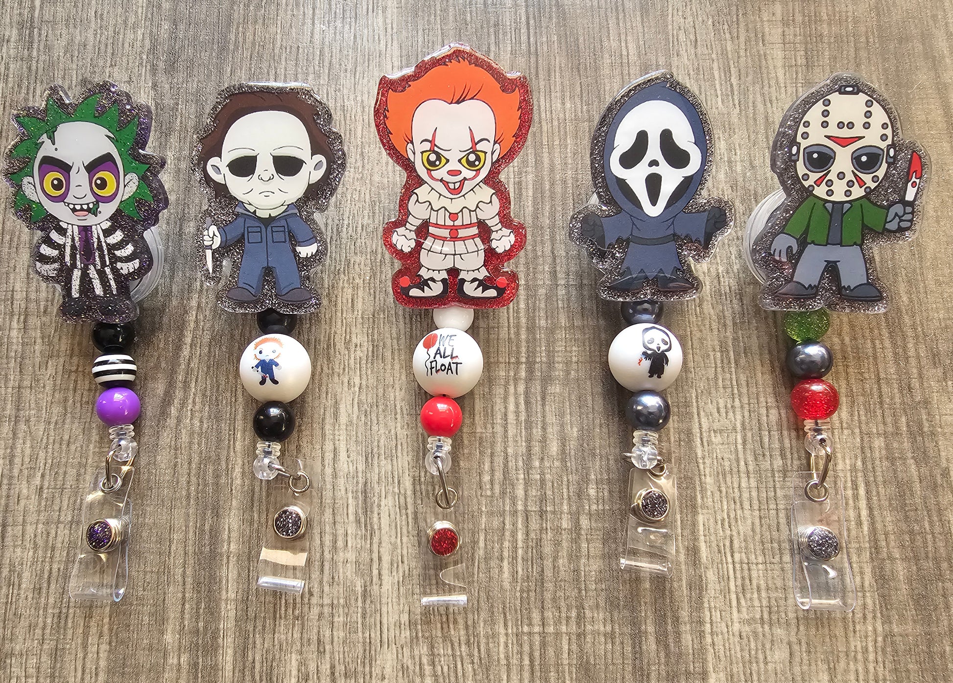 A badge reel featuring villains in the horror world such as Beetlejuice, Michael Myers holding a knife, pennywise from the movie IT, Ghost Face from Scream, and Jason