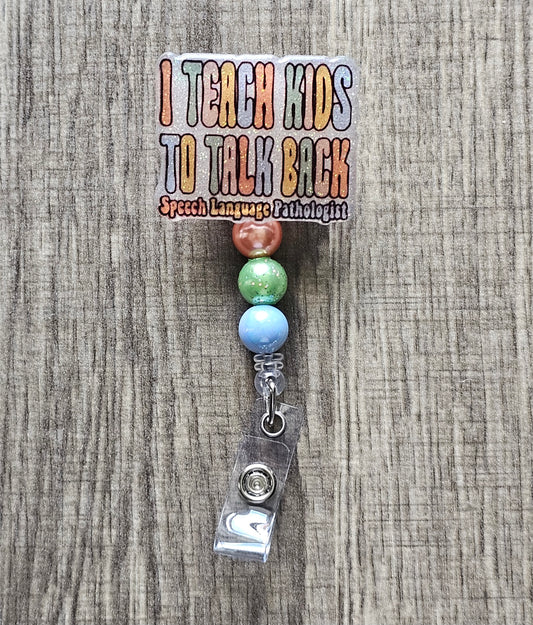 "I Teach Kids to Talk Back, Speech Language Pathologist" badge reel.