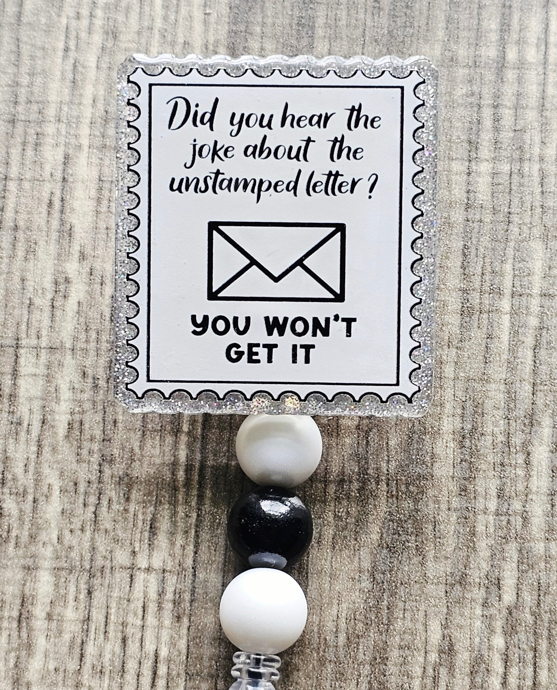 Unstamped Letter Joke Postal Stamp Badge Reel – A Reel Badge Girl